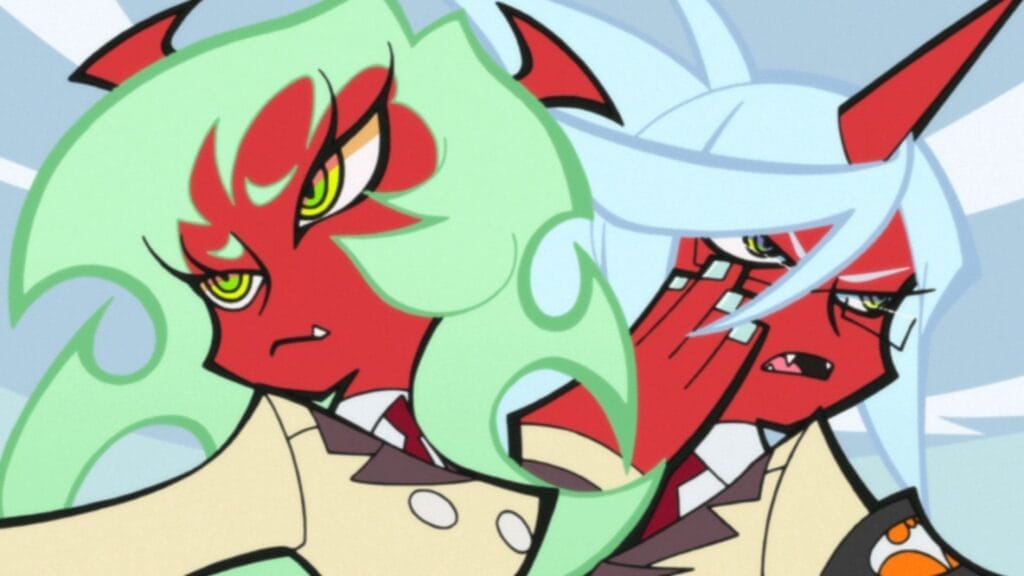 Still from Panty & Stocking with Garterbelt that depicts Scanty and Kneesocks, two red-skinned demons with horns. Scanty has green eyes and hair, while kneesocks is a unicorn horn and blue hair, and is wearing glasses.